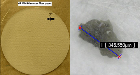 Magnification of particles in hydraulic fitting system using ISO 4405